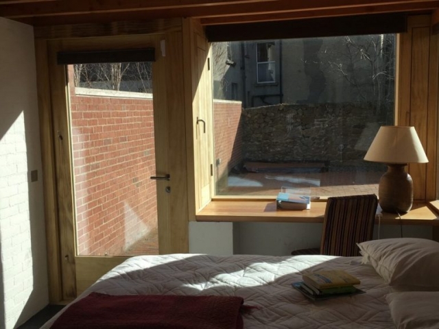 Accoya door & window seat. Architect: Donaghy + Dimond door & window seat.